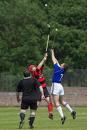 Shinty (being played above) is a traditional Gaelic sport. (photo: lochcarron.org.uk)