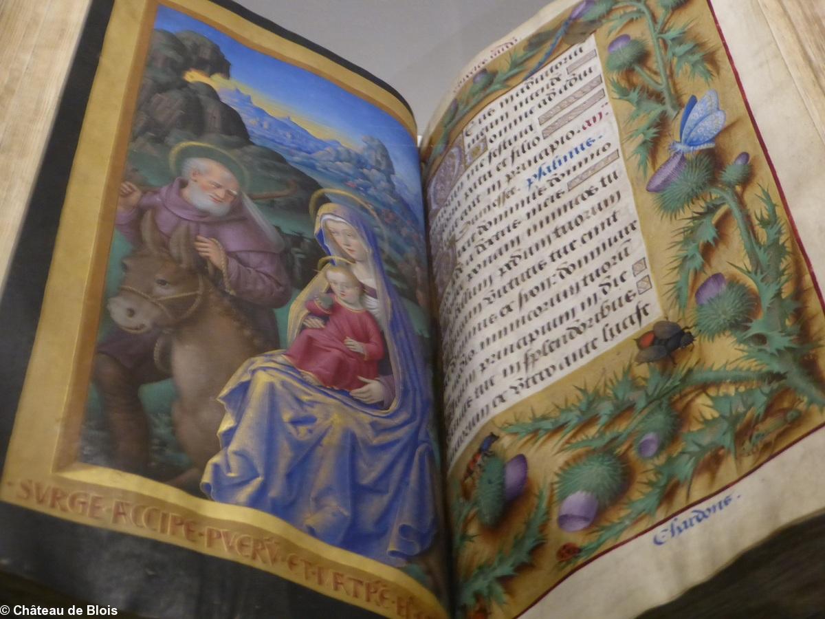 Le Grand livre d'Heures d'Anne de Bretagne f° 76v-77r . La Fuite en Égypte et les chardons.